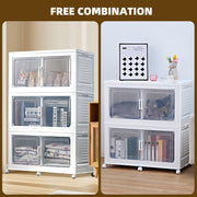 White storage cabinets with transparent drawers on a wooden floor.